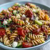 Refreshing Easy Summer Pasta Salad with mozzarella and crisp vegetables, tossed in zesty Italian dressing for a vibrant side dish.  