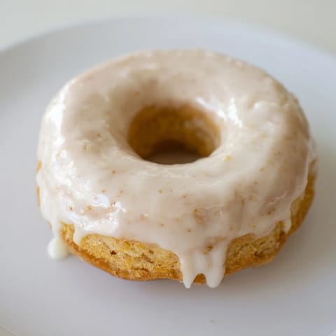 Golden-fried cake donuts with a sweet glaze, perfect for a special breakfast treat you'll love.