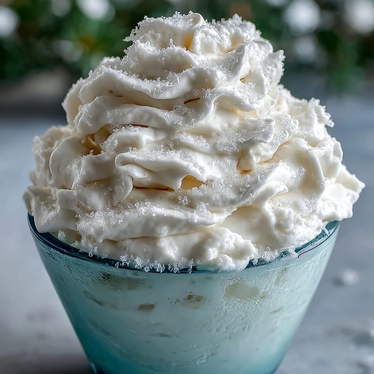 Bright and bubbly TikTok Cloud Slushie, featuring a fluffy consistency and a refreshing citrus flavor, perfect for summer.