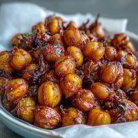 Golden-brown Crispy Chickpea Snack roasted to perfection with warm spices, served warm for a crunchy, protein-packed bite.